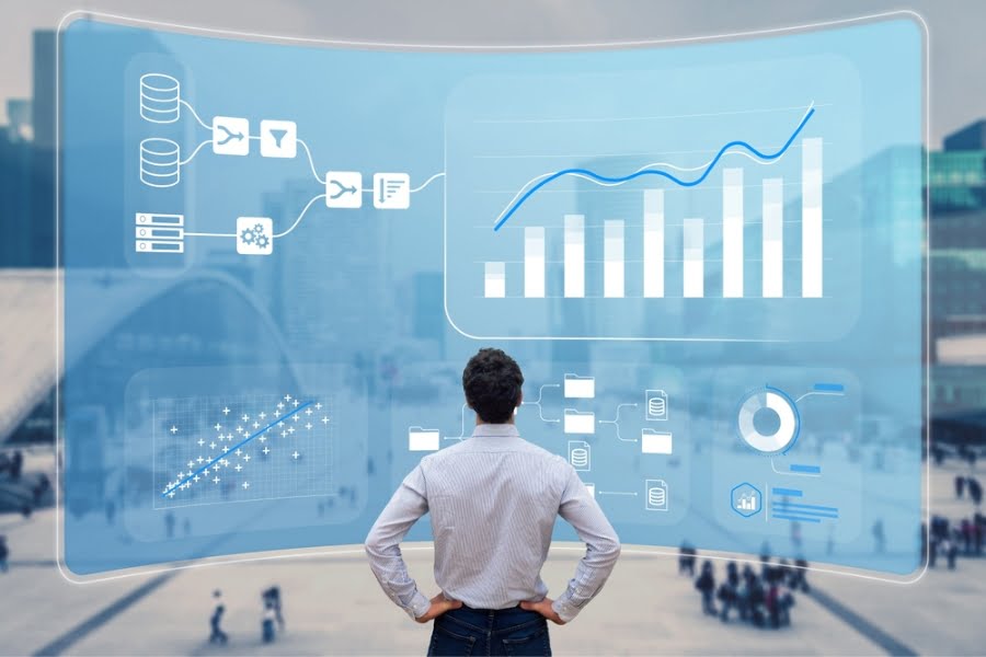 A stylised image of a man reviewing sales coaching feedback electronically
